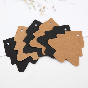 Blank Christmas tree kraft paper tags in black and brown with pre-punched holes