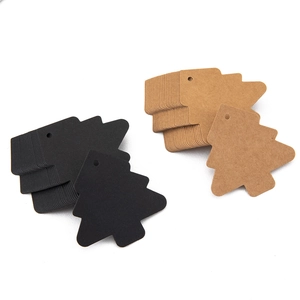 Brown and black Christmas tree shaped kraft paper tags with pre-punched holes