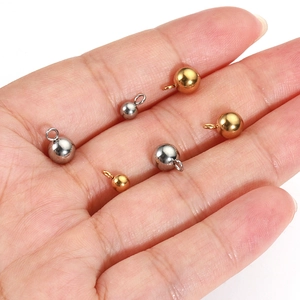 Colgantes de bola de acero inoxidable dorado y plateado para creación de joyas DIY