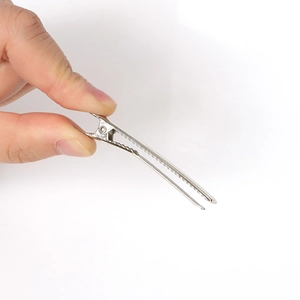 Sliver metal duckbill hair clip with anti-slip teeth shown in open position