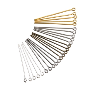 Assorted eye pins in gold, silver, bronze, and black finishes for DIY jewelry making