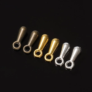 Metal teardrop bead charms for jewelry making in gold silver and bronze finish