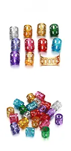 Detailed macro view of colorful filigree metal dreadlock cuffs and hair jewelry rings