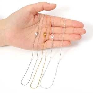 Set of fine metal necklace chains in gold and silver finish with lobster clasp
