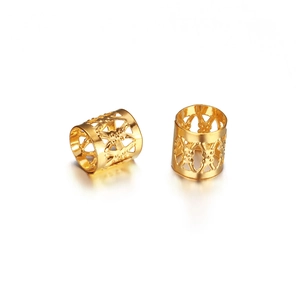 Hollow gold metal dreadlock beads with intricate patterns for hair decoration