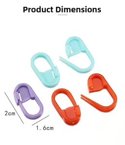 Detailed view of plastic knitting stitch markers showing 2cm x 1.6cm product dimensions