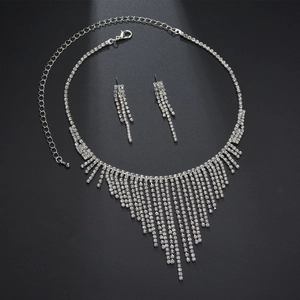 Sparkling silver fringe necklace and long tassel earrings set with clear rhinestones