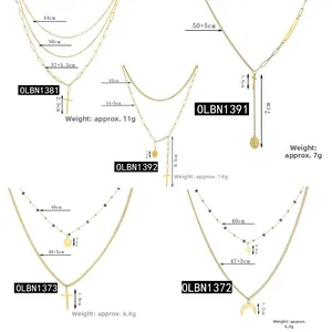 Collane multistrato in titanio oro 14K con croce e luna nella tabella delle misure