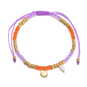 Bohemian adjustable beaded bracelet with sun pendant and pearl on white background