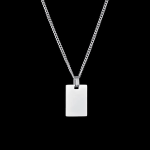 Detailed close-up of polished silver square military pendant on a sleek cuban link chain