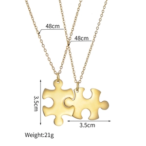 Detailed dimensions of interlocking puzzle piece pendant necklace in gold finish
