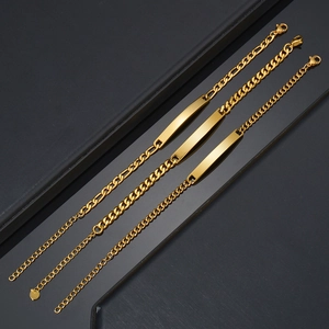 Three gold stainless steel curb and figaro chain bracelets with blank ID identity plates