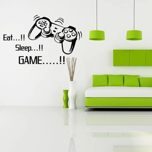 Close-up of Eat Sleep Game wall decal showing gaming controller and creative quote detail