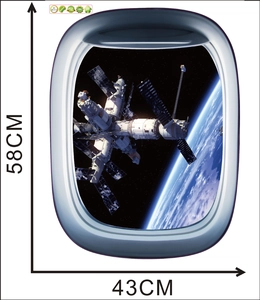 Macro view of a 3D window wall sticker showing a space station orbiting earth, 58x43cm