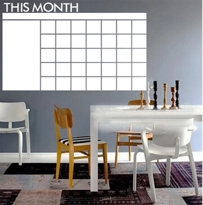 Detailed view of white dry erase monthly calendar wall sticker for home office planning