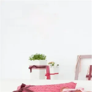 Detail of pink Always KISS ME goodnight wall sticker with hearts on white wall