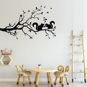 Creative black squirrel and bird silhouette wall decal in a Nordic style kids room