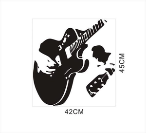 Detail view of black vinyl guitar player silhouette wall sticker measuring 45cm by 42cm
