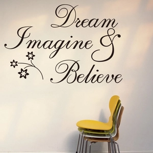 Inspirational Dream Imagine Believe vinyl wall decal with floral accents on white wall