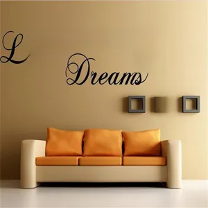 Close-up of Live Your Dreams wall decal with black PVC lettering and butterfly design