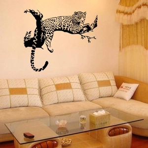 Removable black and white leopard wall sticker depicting a panther on a tree branch