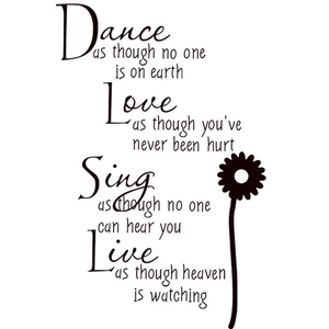 Detail of elegant black inspirational quote wall decal with minimalist daisy floral art