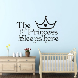 Detail of The Princess Sleeps here wall sticker with crown and heart decals for kids room