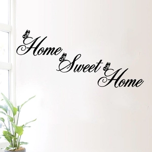 Minimalist black Home Sweet Home wall decal with butterfly accents for living room decor