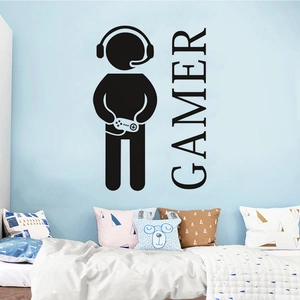 Detail of black vinyl gamer wall sticker featuring a silhouette with headset and GAMER text