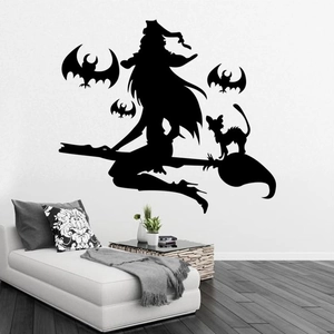 Detail of black vinyl witch and bat wall stickers for Halloween home decoration