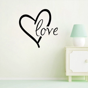 Sticker mural cœur et amour minimaliste noir pour une décoration intérieure moderne