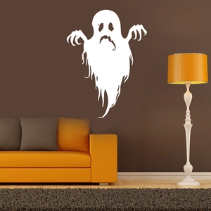 Ghost wall sticker decoration on a dark wall above an orange sofa for Halloween decor