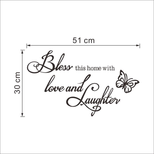 Detail view of Bless this Home wall decal showing 51cm x 30cm size and butterfly motif