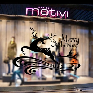 Sticker de Noël détaillé avec renne bondissant et texte Merry Christmas sur vitrine
