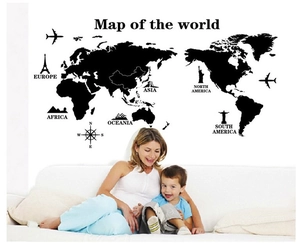 Detail of world map wall sticker featuring continents and famous global landmarks