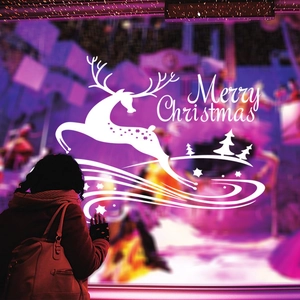 Sticker de Noël blanc avec renne et inscription Merry Christmas sur fenêtre