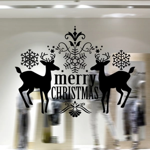 Detail of black reindeer silhouette wall decal with Merry Christmas text for windows
