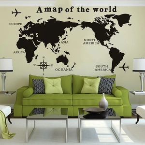 Modern black world map wall decal with compass and plane icons for living room decor