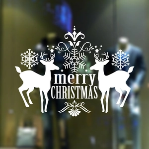 White Christmas reindeer window stickers with Merry Christmas text and snowflake decals