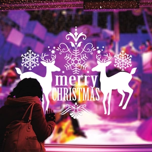 White Merry Christmas window decal with reindeer and snowflakes for festive glass decoration