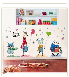 Nursery wall stickers featuring cartoon animals like giraffes and owls in hand-painted style