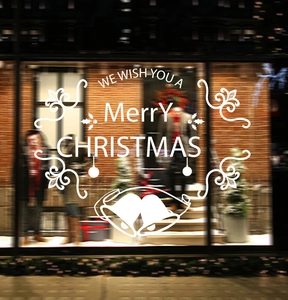 White Christmas window sticker with bells and Merry Christmas lettering for shop decor
