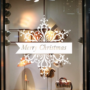 White snowflake window decals with Merry Christmas text for festive home decoration