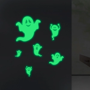 Luminous Halloween ghost wall stickers glowing bright green in the dark for room decor