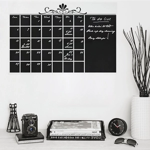 Minimalist chalkboard wall sticker featuring a monthly calendar and notes section for office