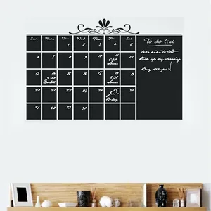 Detail of black monthly calendar chalkboard wall sticker with to-do list and vine pattern