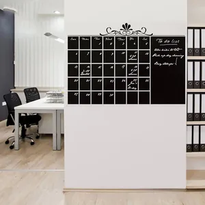 Macro view of monthly calendar chalkboard wall sticker with to-do list in office setting