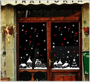 Christmas window stickers with white snowflakes and red houses for holiday decoration