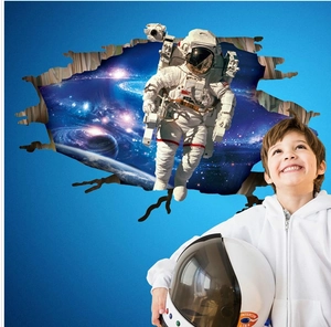3D space astronaut wall sticker showing a realistic galaxy breach on a blue wall