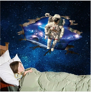 3D outer space wall sticker showing an astronaut in a nebula for kids' bedroom